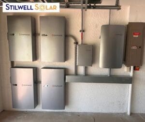 Solar battery storage on the side of a house.
