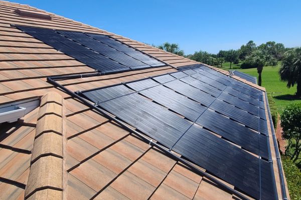 solar-pool-heating-installation-on-brown-roof